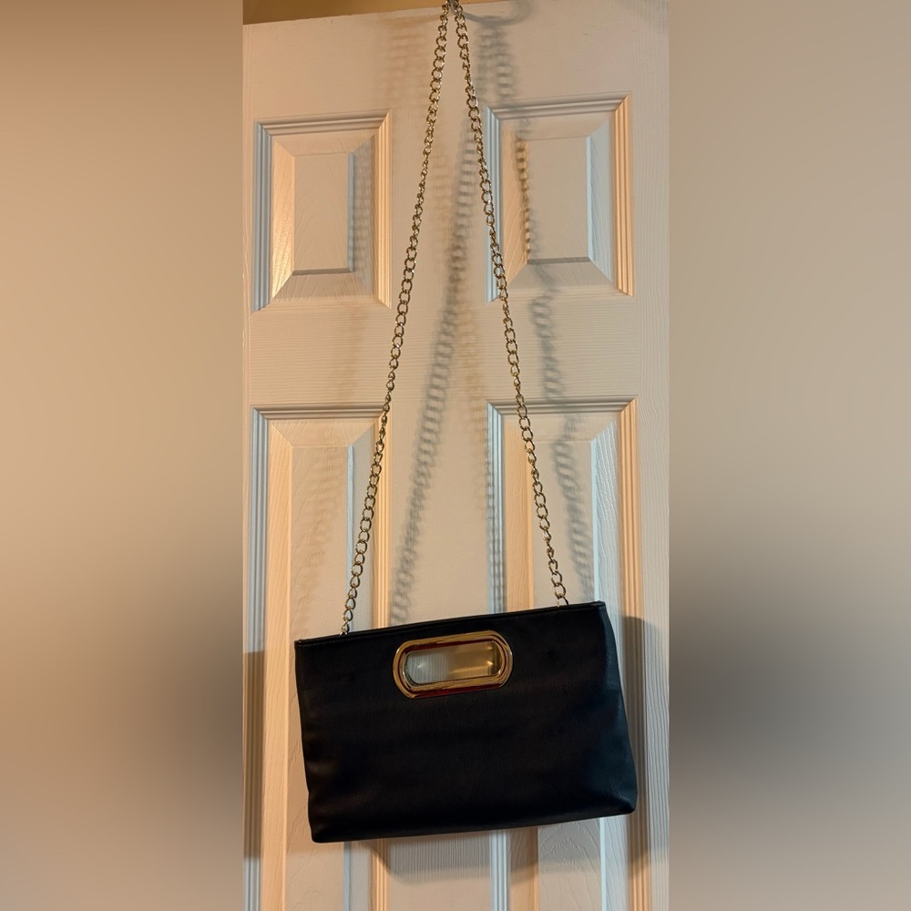 Charming Charlie Black and Gold Clutch